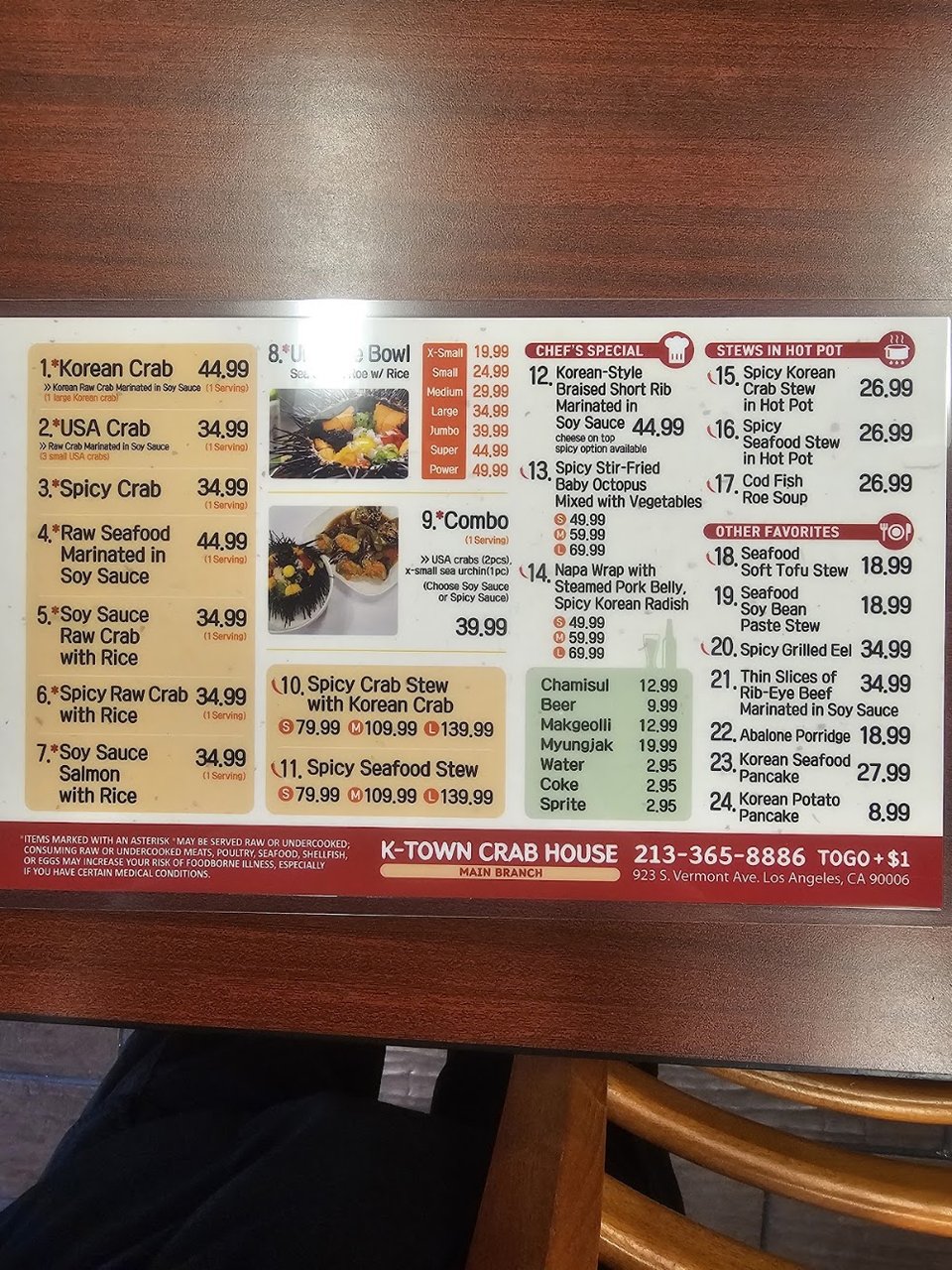 Printed seafood menu with crab dishes.